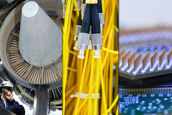 An image of a wind turbine, wire, and motherboard combined into one image.